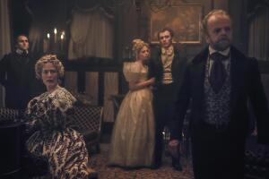 Gillian Anderson as Julia, Harry Melling as Edgar Allen Poe, Lucy Boynton as Lea, Harry Lawtey as Artemus, Toby Jones as Dr. Marquis, , in The Pale Blue Eye. Cr. Scott Garfield Netflix.jpg