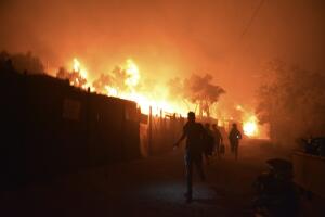 APTOPIX Greece Migrant Camp Blaze