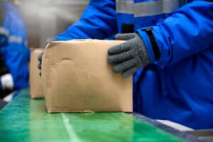 Package boxes on conveyor