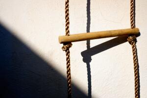 Scale with wooden link in the sun