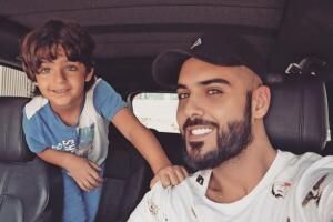 omar y su hijo.JPG