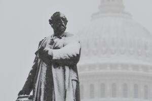 A snow covered statue of James Garfield