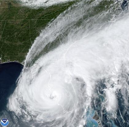 This satellite image taken at 3:06 p.m. EDT and provided by NOAA shows Hurricane Ian making landfall in southwest Florida near Cayo Costa on Wednesday, Sept. 28, 2022, as a catastrophic Category 4 storm. (NOAA via AP)