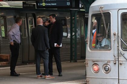 NEW YORK, NEW YORK - JULY 30: NYPD officers investigate the scene of a man hit by a train at the Prospect Park subway stop on July 30, 2025 in the Prospect Lefferts Gardens neighborhood of the Brooklyn borough in New York City. (Photo by Michael M. Santiago/Getty Images)