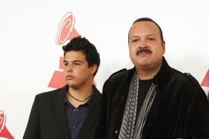 Pepe Aguilar (C) with his son and wife a