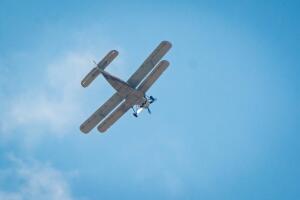 Light aircraft high in clouds
