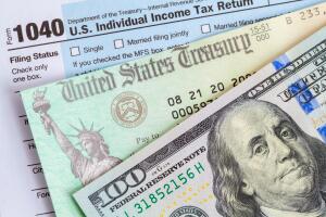 Money with Tax Check and 1040