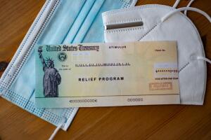 Stimulus relief program check. Close up view