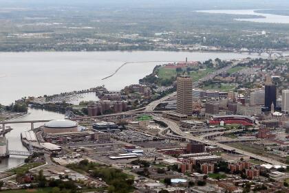 BUFFALO, NY - SEPTEMBER 29: An aerial view of Buffalo New York facing Lake Erie and Fort Erie, Canada as photographed on September 29, 2012 in Buffalo, New York. The First Niagara Center is on the far left. (Photo by Bruce Bennett/Getty Images)